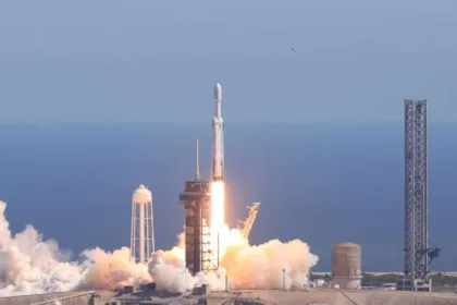 Liftoff of the Europa Clipper mission amid columns of smoke