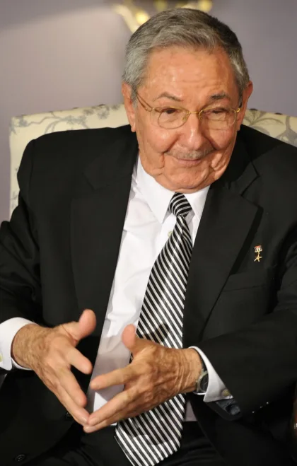 File photo of Raúl Castro seated in a dark suit, white shirt and striped tie during a meeting with Russian Prime Minister Dmitri Medvedev on July 11, 2012.