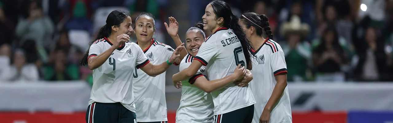 Mexico women’s national-team players celebrating together